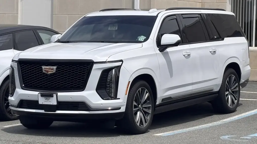 White 2026 Cadillac Escalade ESV at a dealership in Florham Park, New Jersey