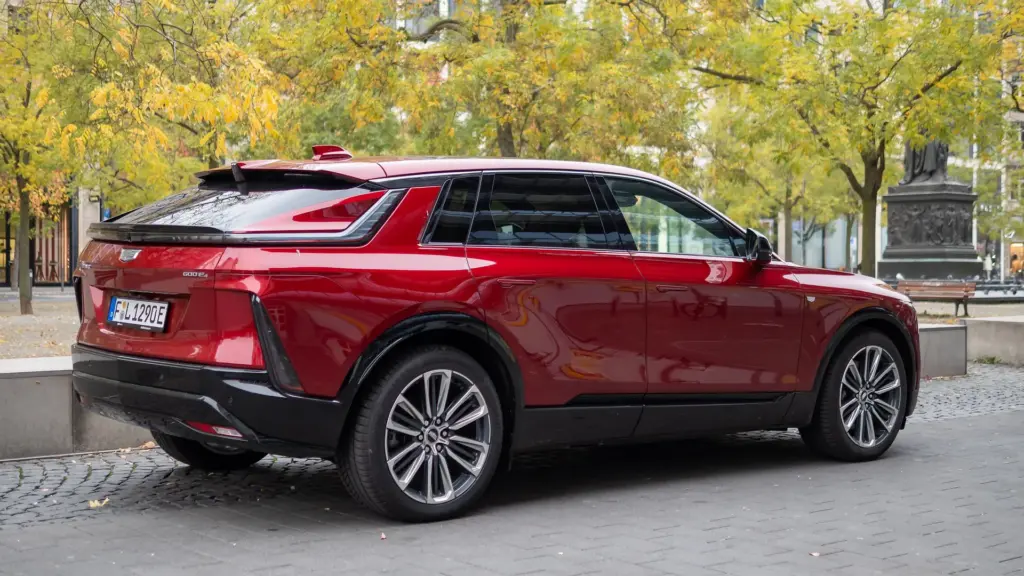 Red Cadillac Lyriq Sport electric SUV parked in Frankfurt am Main, Germany