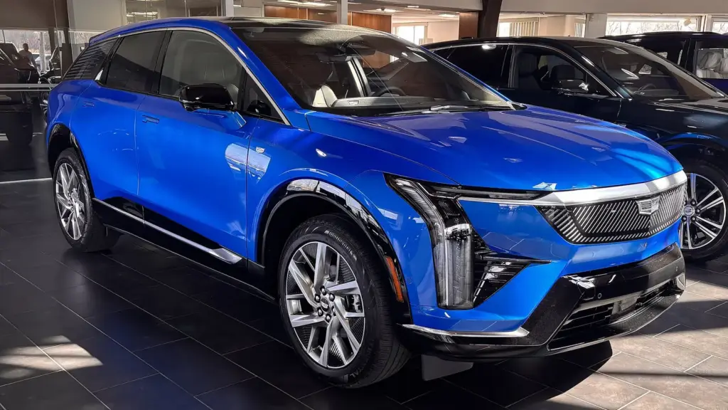 Blue 2026 Cadillac Optiq electric SUV in a showroom in Florham Park, New Jersey