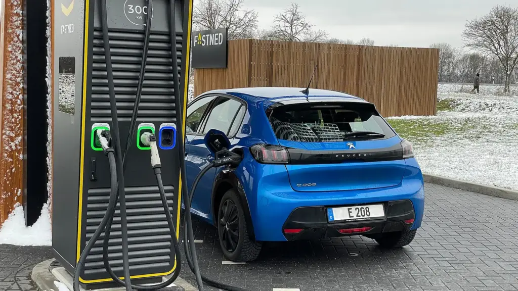 Electric car charging with a CCS2 plug at a high-power charger in Europe