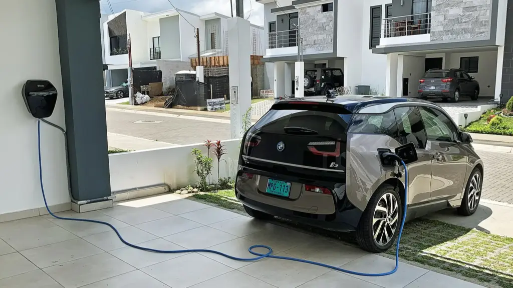 Electric car charging at a Level 2 home wallbox