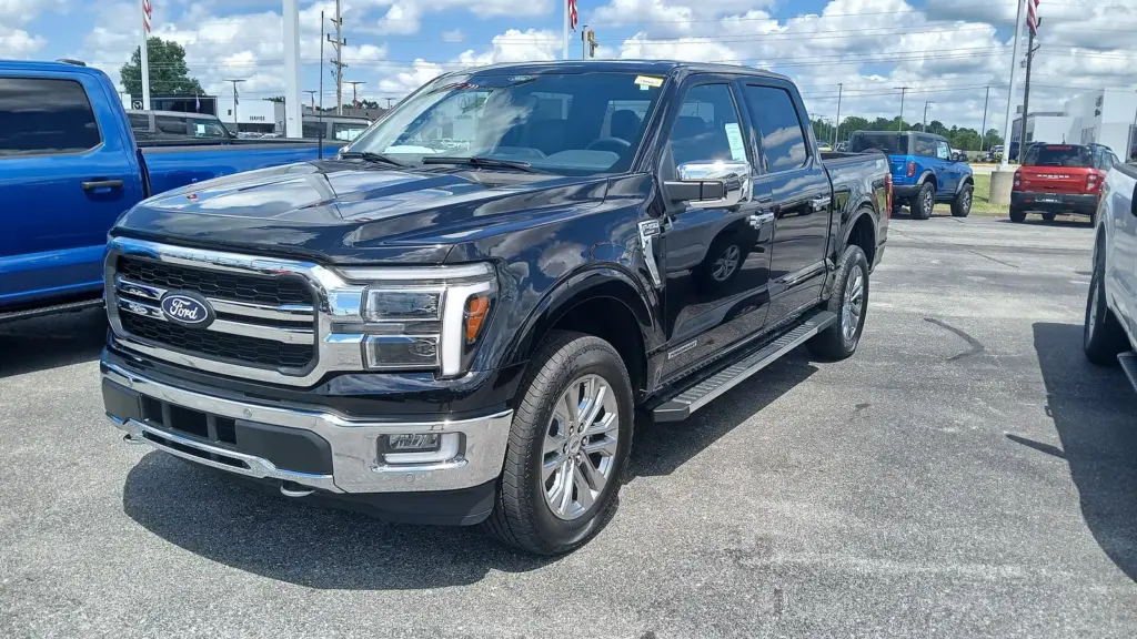 Black 2024 Ford F-150 Lariat SuperCrew PowerBoost hybrid pickup, front view