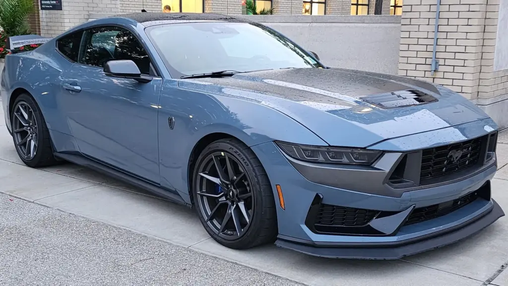 Blue-grey 2024 Ford Mustang Dark Horse, seventh-generation Mustang, parked outdoors