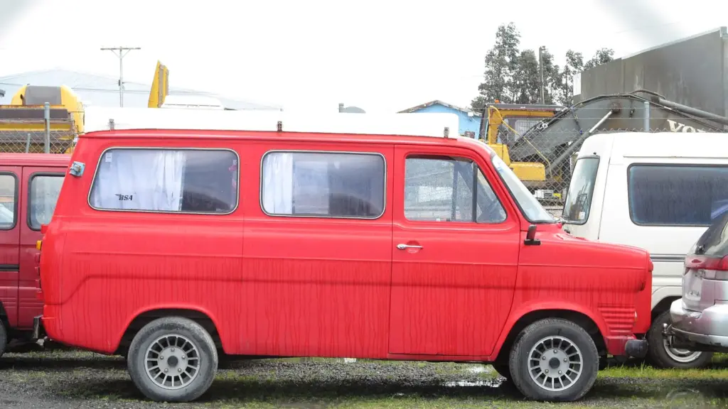 Red first-generation Ford Transit (Mk1) van