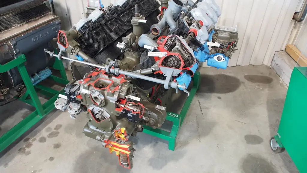Cutaway gasoline engine showing pistons, valves and crankshaft
