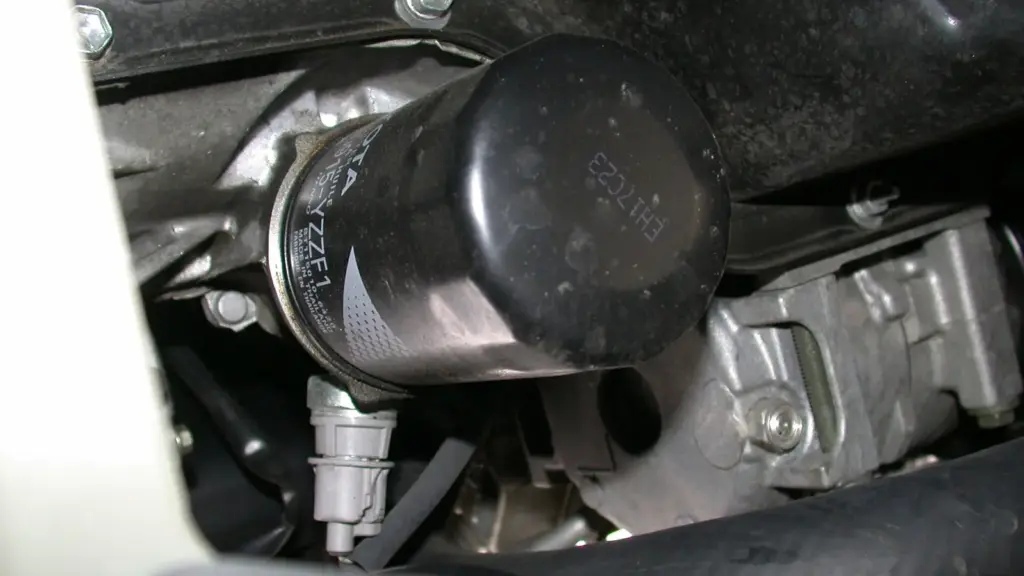 Engine oil filter fitted to a car engine