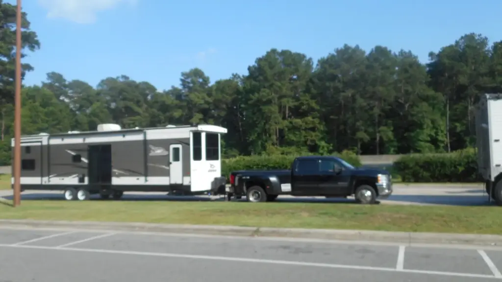 Heavy-duty pickup truck towing a travel trailer