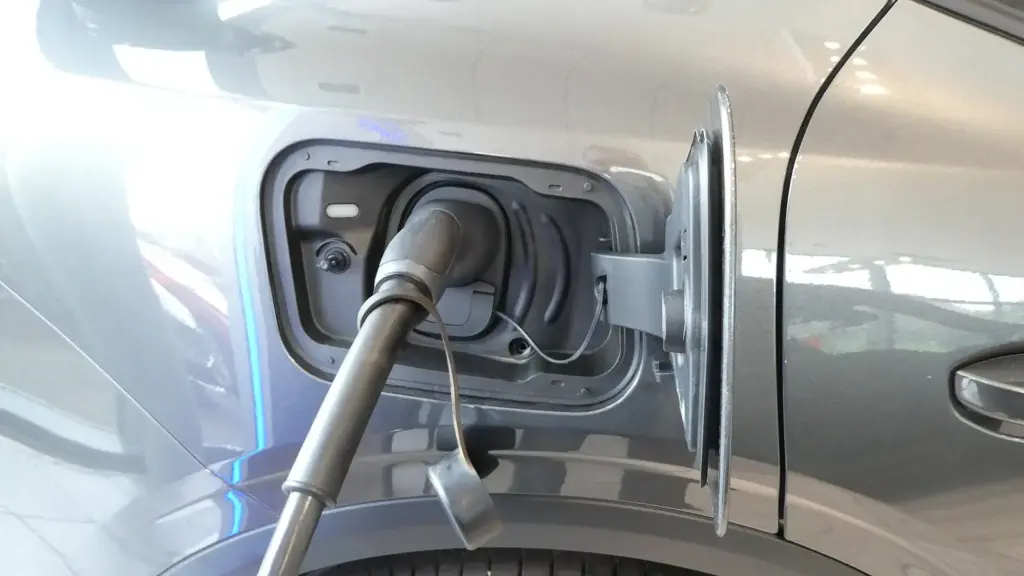 Charging cable plugged into a car charging socket