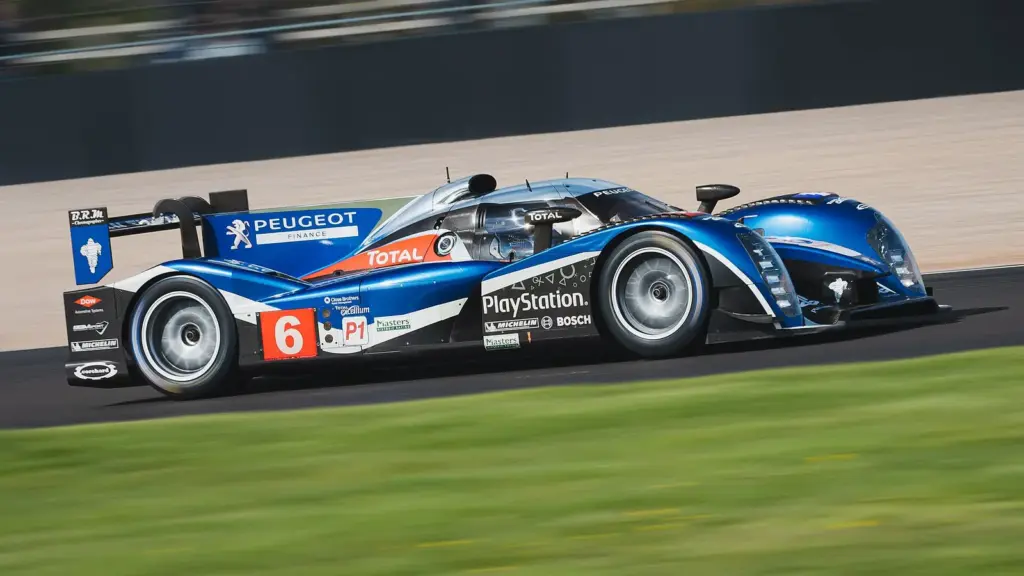 Peugeot 908 Le Mans prototype in a historic race at Donington Park