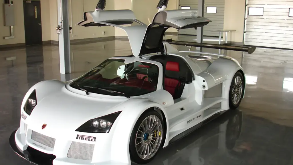 Gumpert Apollo sports car in the pit garage at Dubai Autodrome