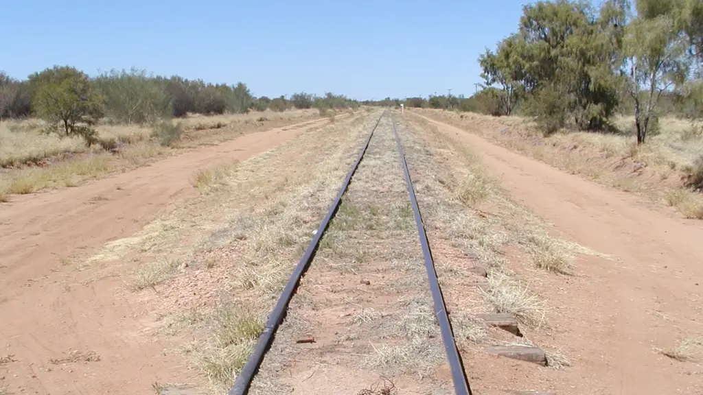 The old Central Australia Railway line near Alice Springs, whose corridor the Finke Desert Race follows