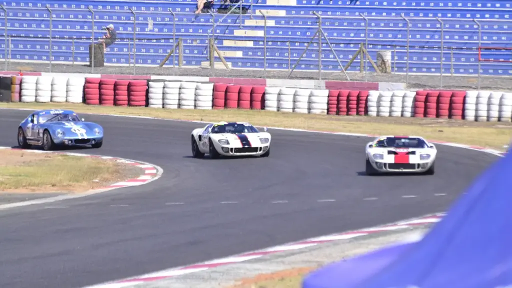 Classic Ford GT40s racing at Killarney International Raceway in Cape Town