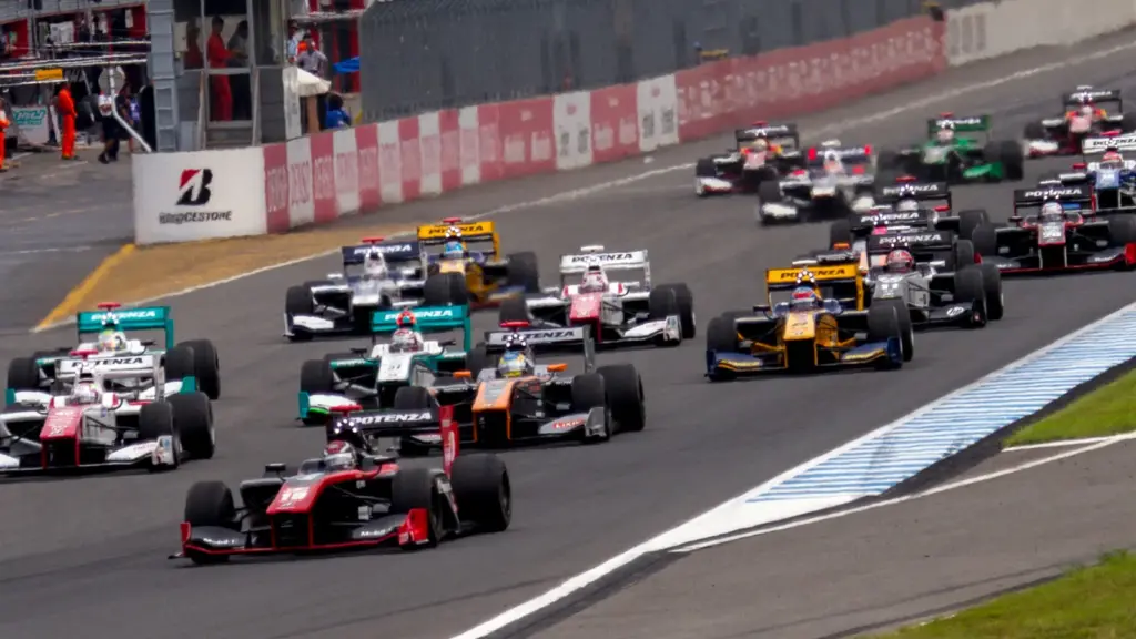 Super Formula cars on the opening lap at Mobility Resort Motegi