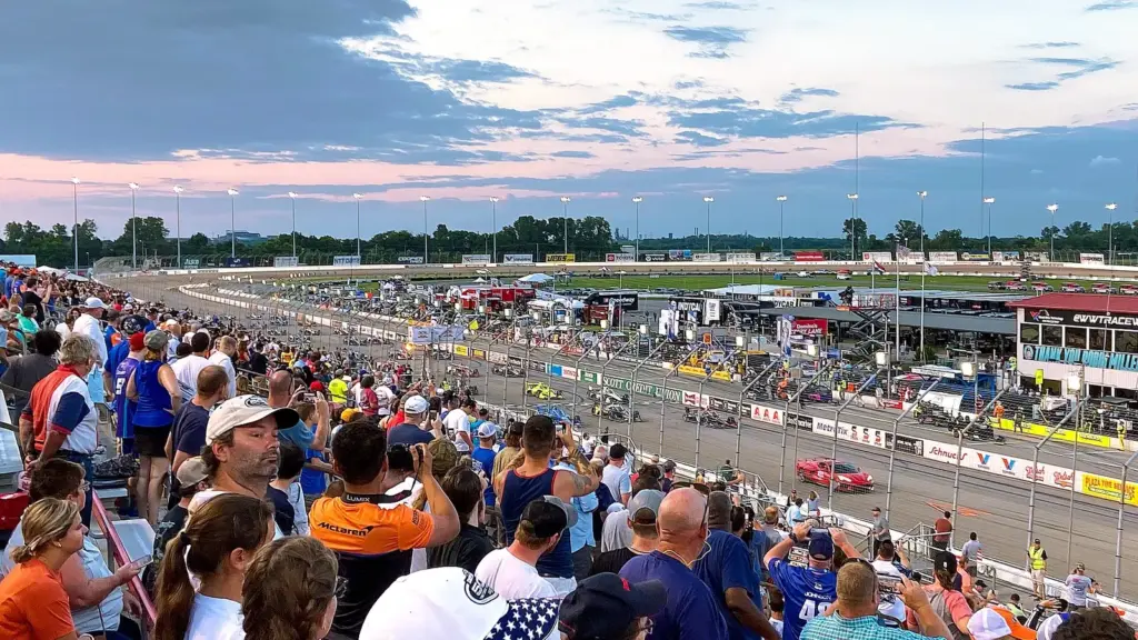 IndyCar field saluting fans before the race at World Wide Technology Raceway near St. Louis