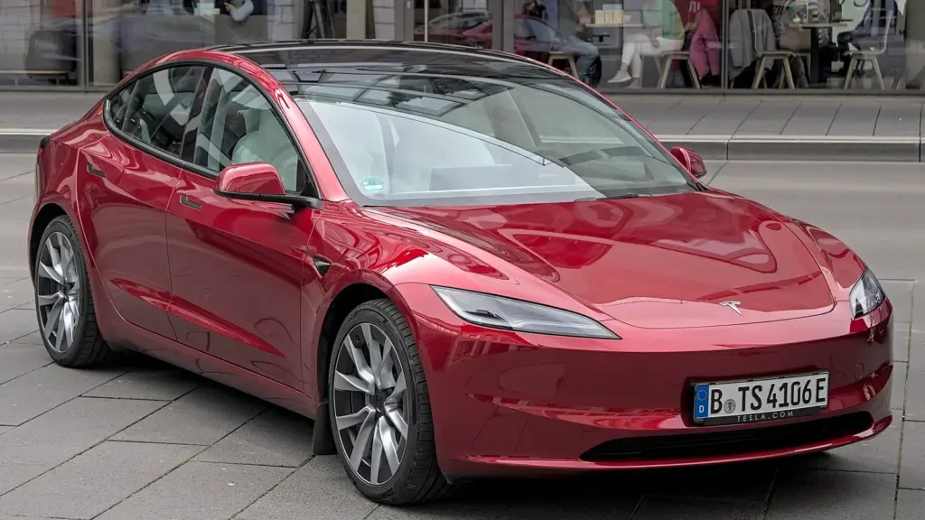 Red Tesla Model 3 (2023 facelift) at Autofrühling Ulm, Germany