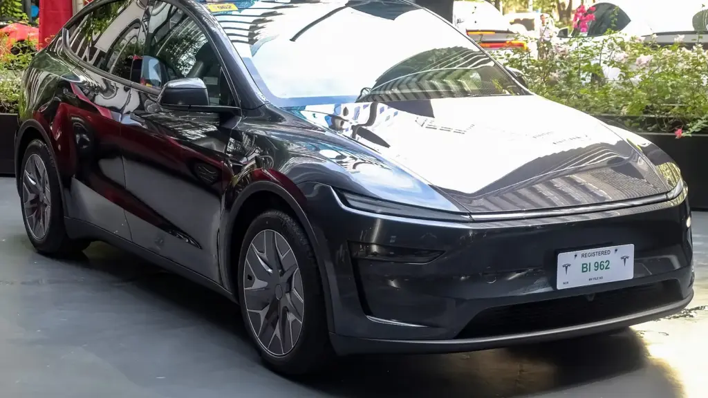 Stealth Grey Tesla Model Y L six-seat SUV at a delivery day in the Philippines