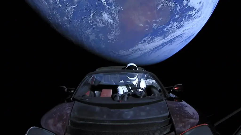 Tesla Roadster with the Starman mannequin in space, with Earth in the background, February 2018
