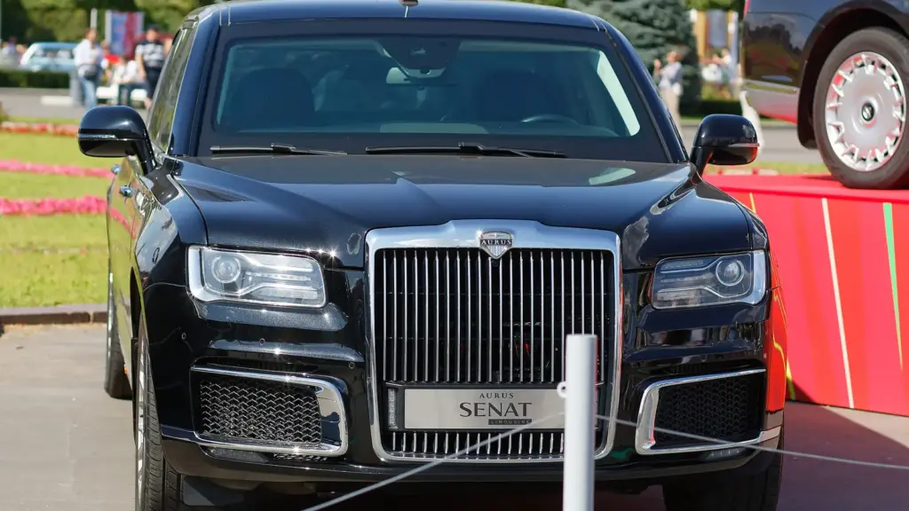 Black Aurus Senat Limousine at a Moscow auto show, 2025