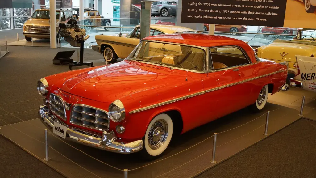 Red 1955 Chrysler C-300 hardtop in a museum