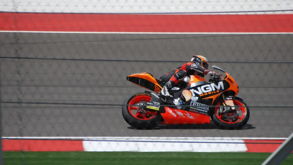 A motorcycle racer at speed at Circuit of the Americas during the 2013 Grand Prix of the Americas weekend