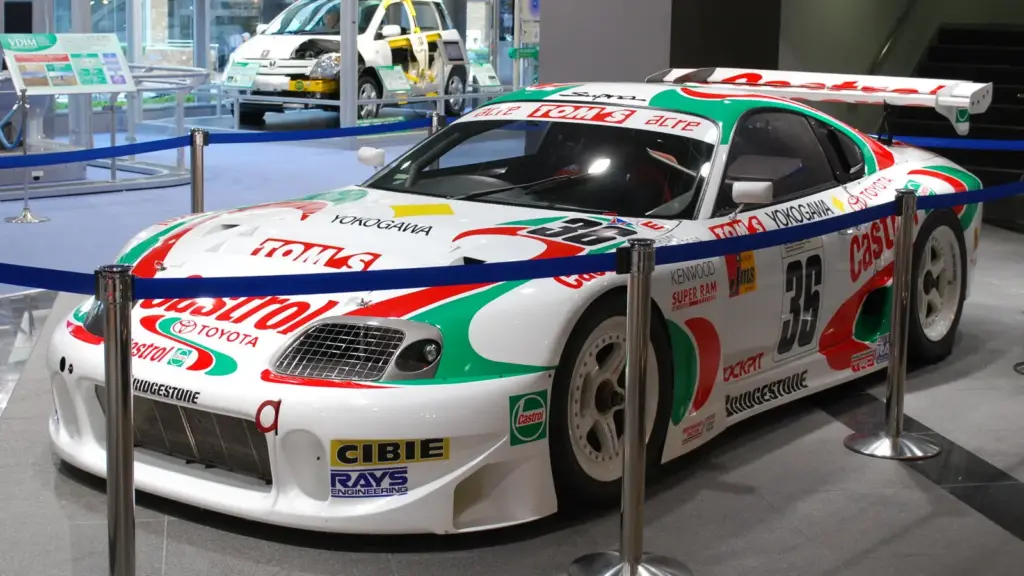 The 1997 Castrol TOM'S Toyota Supra JGTC GT500 car on display at Amlux Tokyo
