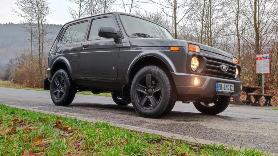 Black 2021 Lada Niva Legend Urban parked on a gravel lot