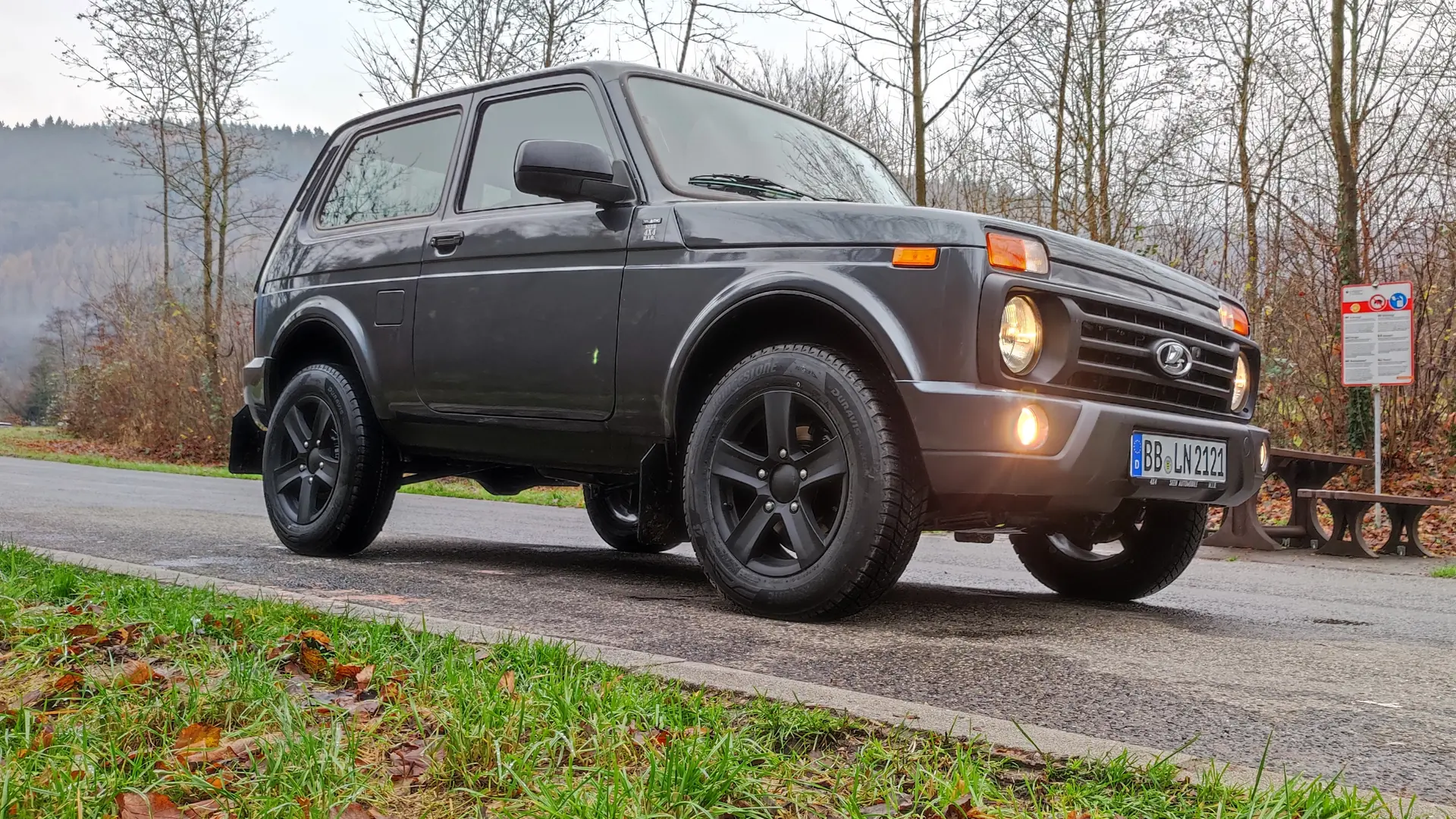 Black 2021 Lada Niva Legend Urban parked on a gravel lot