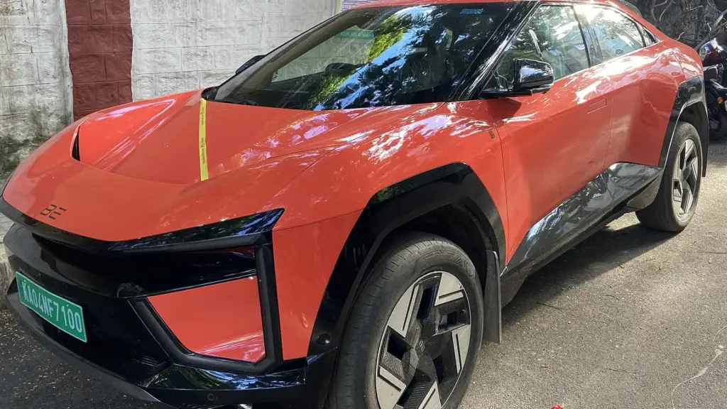 Orange Mahindra BE 6 electric SUV