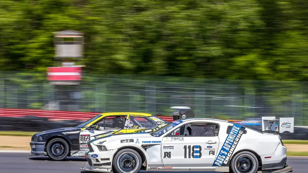 White Ford Mustang American Iron race car at Mid-Ohio