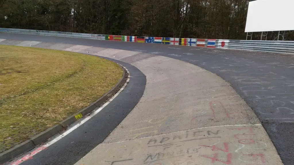 The banked concrete Caracciola-Karussell corner on the Nürburgring Nordschleife