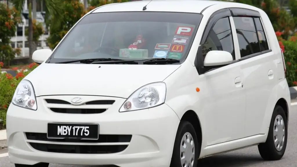 White Perodua Viva hatchback in Malacca