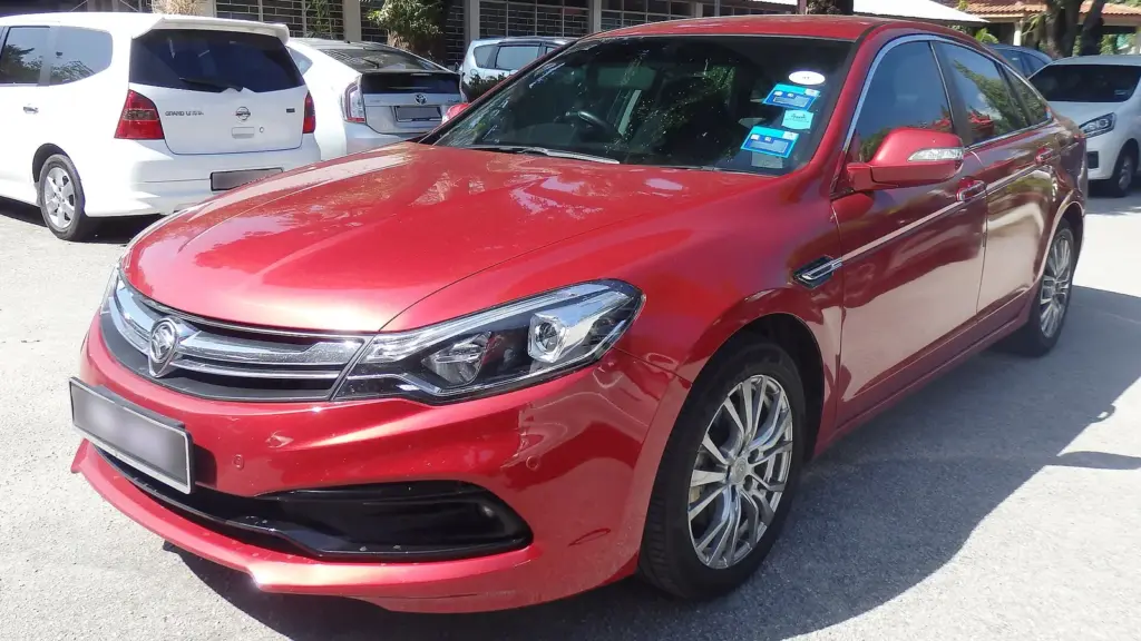 Red second-generation Proton Perdana 2.0 sedan