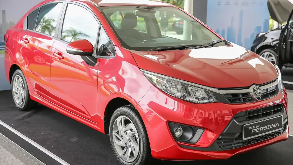 Red Proton Persona sedan, front three-quarter view