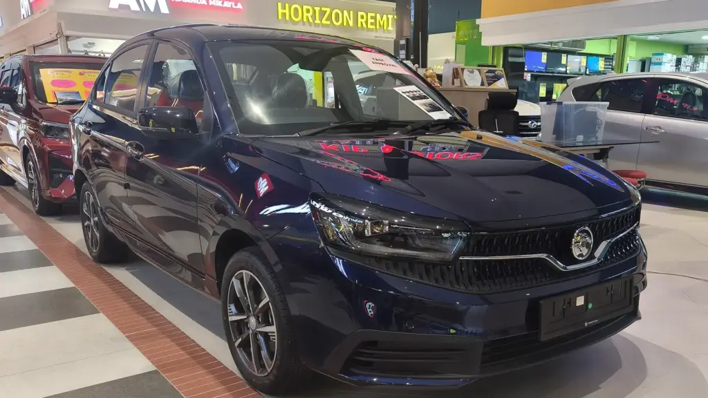 Dark blue Proton Saga MC3 sedan on display in May 2026