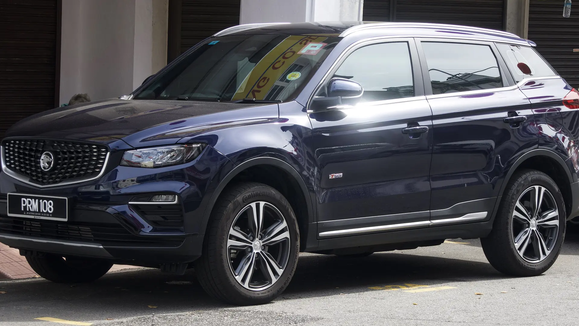 Dark blue 2024 Proton X70 Executive SUV, front view