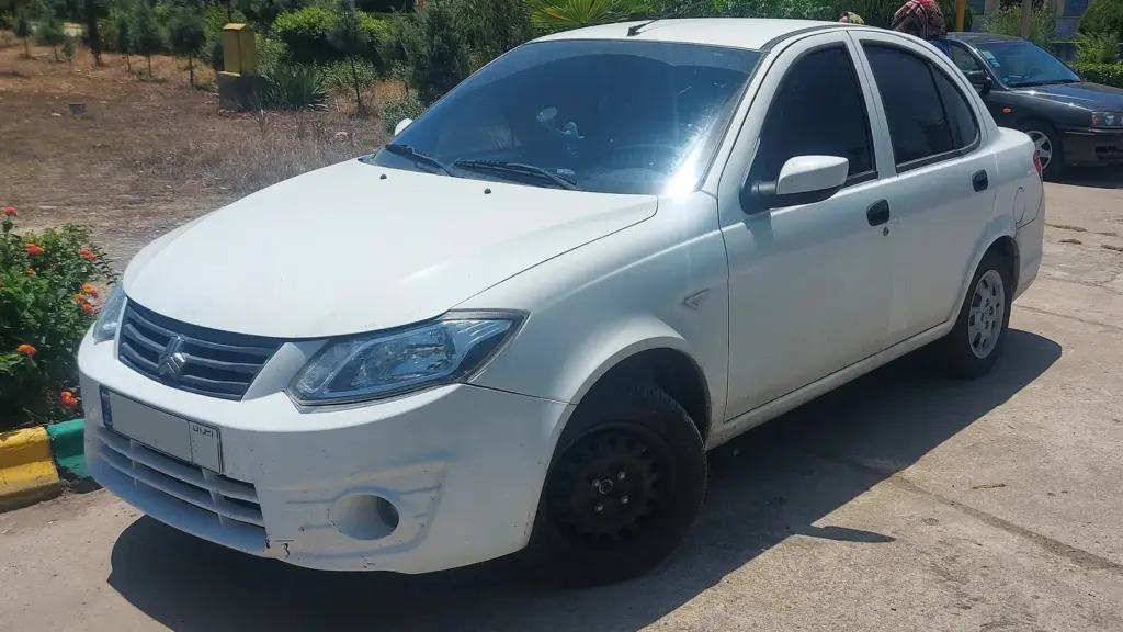 White Saipa Saina sedan photographed in Sari, Iran