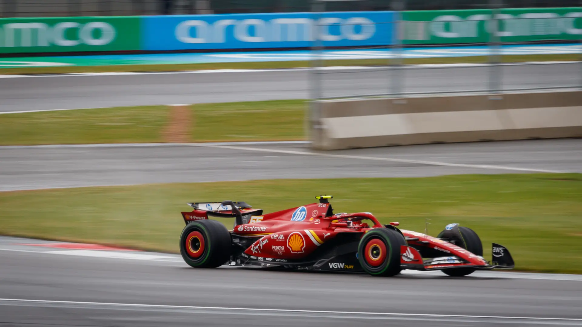 A Ferrari Formula 1 car at speed during the 2024 British Grand Prix at Silverstone