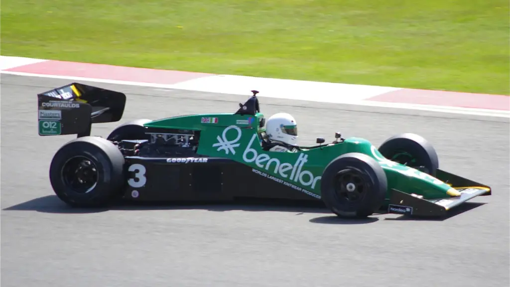 A 1983 Tyrrell 012 Formula 1 car racing at the 2012 Silverstone Classic historic meeting