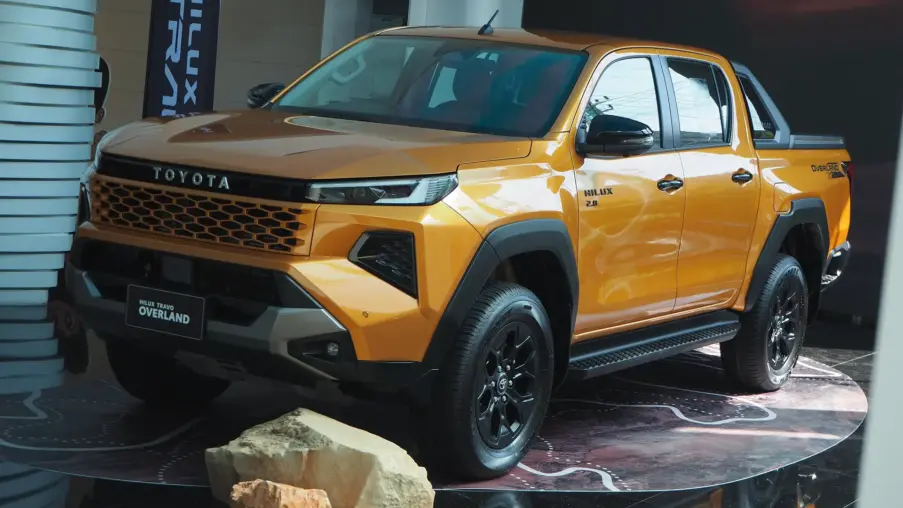 Orange ninth-generation Toyota Hilux Overland double cab on display in Bangkok, Thailand