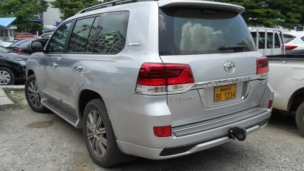 Silver 2017 Toyota Land Cruiser 200 Series VX Limited, rear three-quarter view, in Thailand