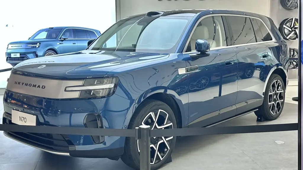 Blue Xiaomi Sky Nomad N70 range-extender SUV in a Xiaomi store