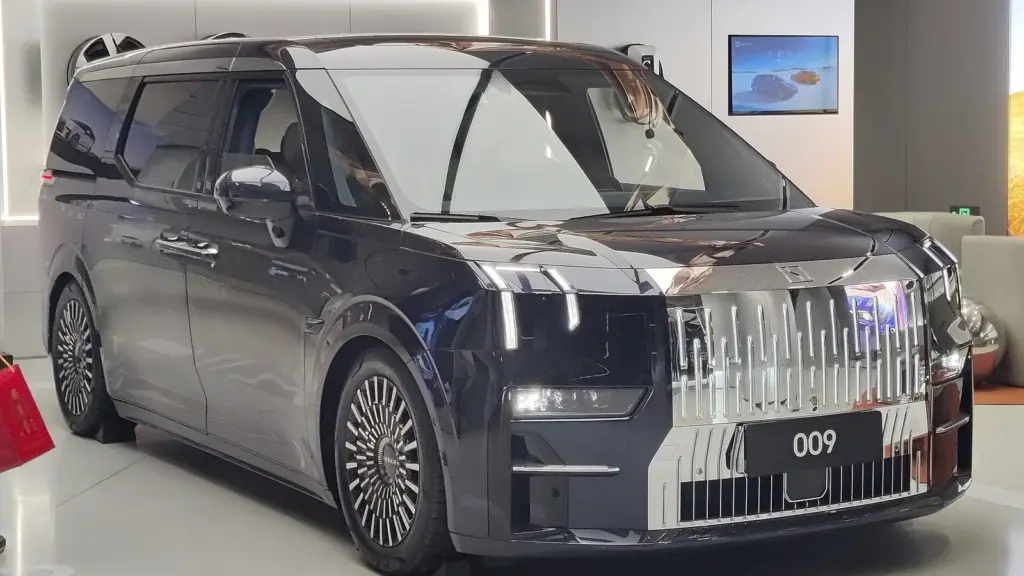 Black Zeekr 009 electric MPV in a showroom